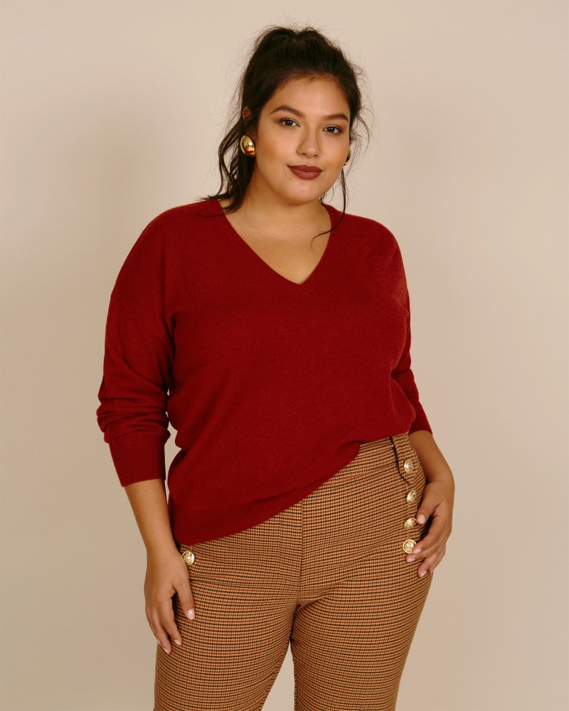 Front of a model wearing a size 0 Cashmere Ava Sweater in Rust by 11 Honoré Collection. | dia_product_style_image_id:218885